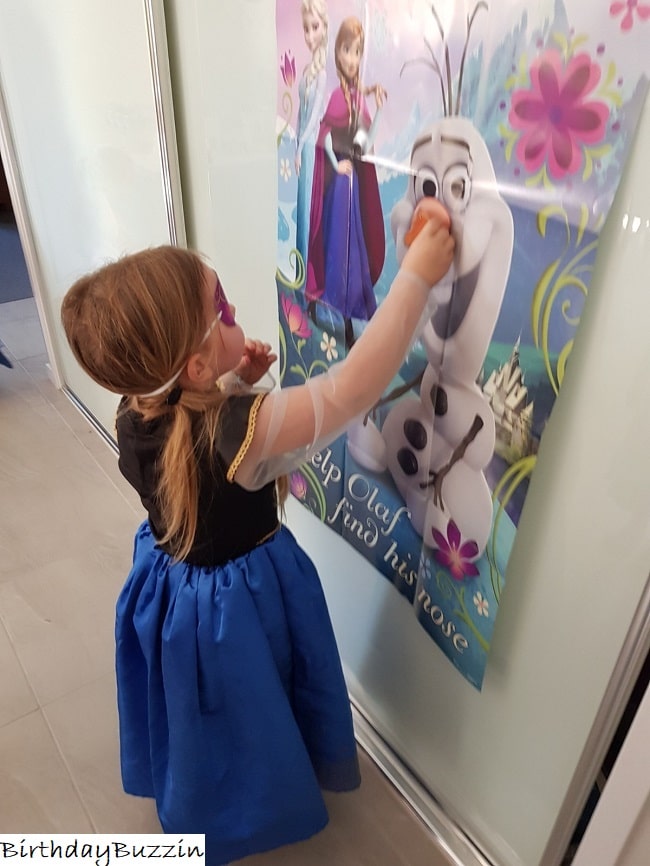 Frozen themed birthday party game ideas - pin the nose on olaf